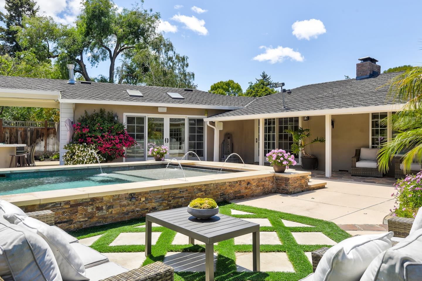 1433 Brookmill Road Los Altos, CA 94024 - Photo 34 of 39 a view of swimming pool and dinning table and chairs in patio