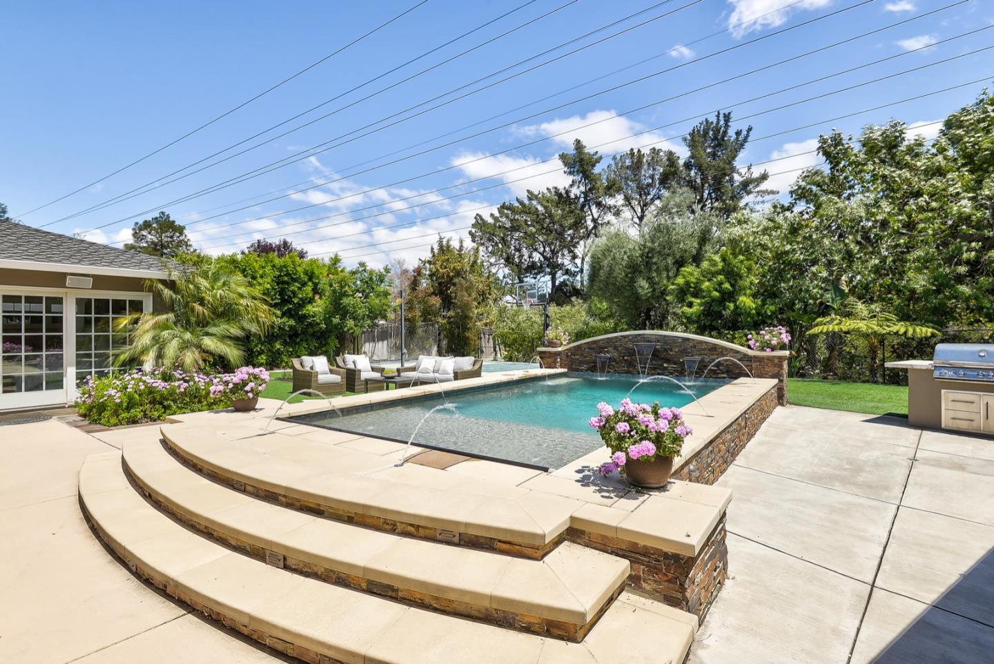 1433 Brookmill Road Los Altos, CA 94024 - Photo 35 of 39 a view of a swimming pool with a patio