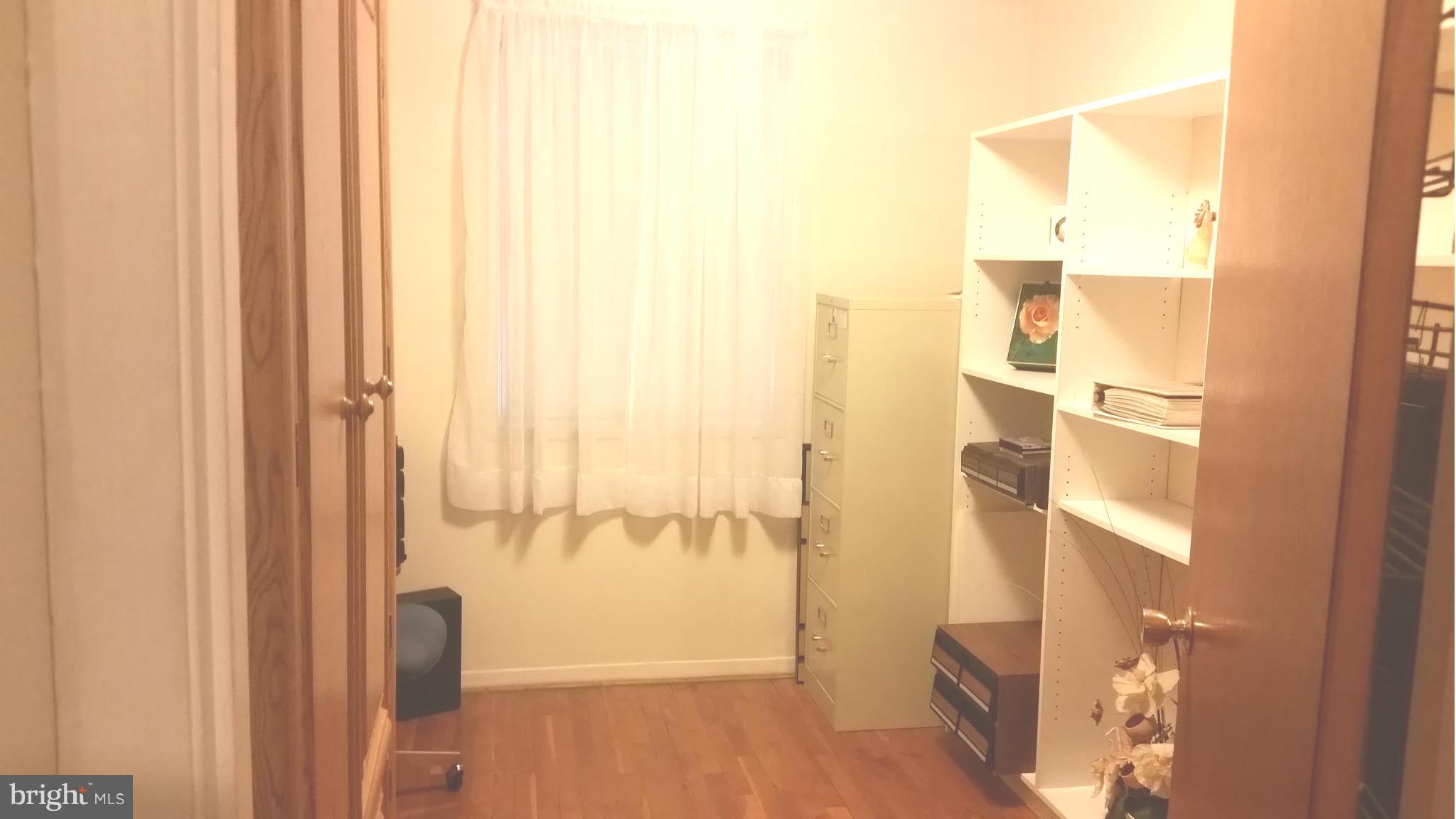 944 Middleborough Road Baltimore, MD 21221 - Photo 15 of 30 a view of walk in closet with window