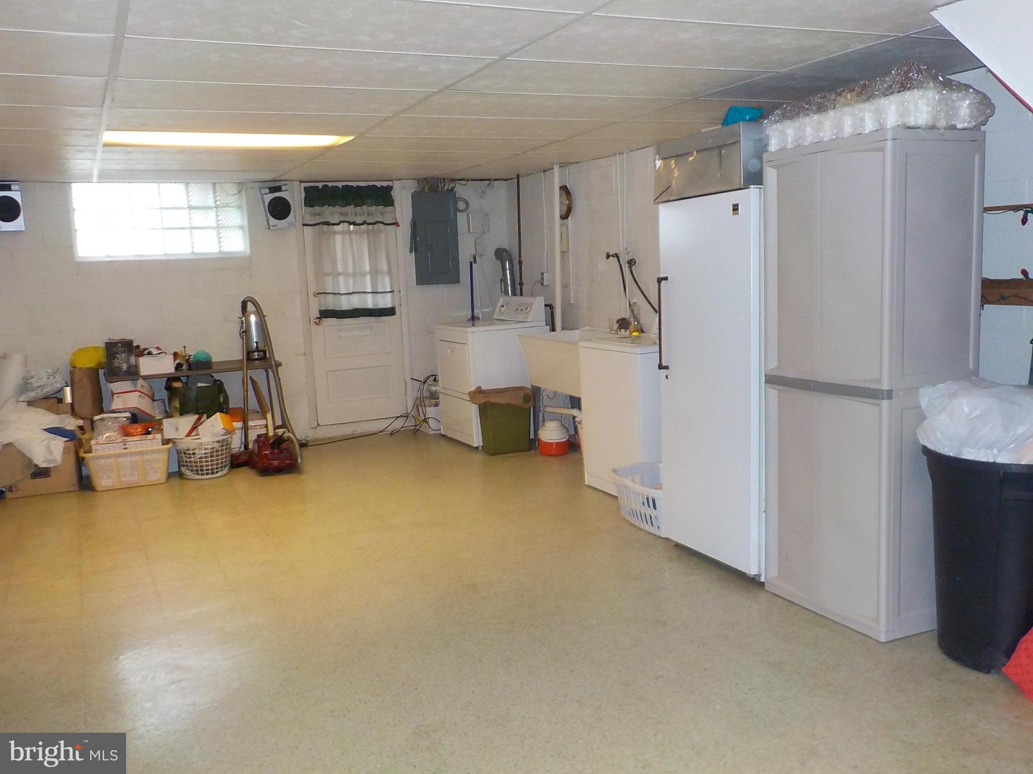 944 Middleborough Road Baltimore, MD 21221 - Photo 20 of 30 a storage room with cabinets