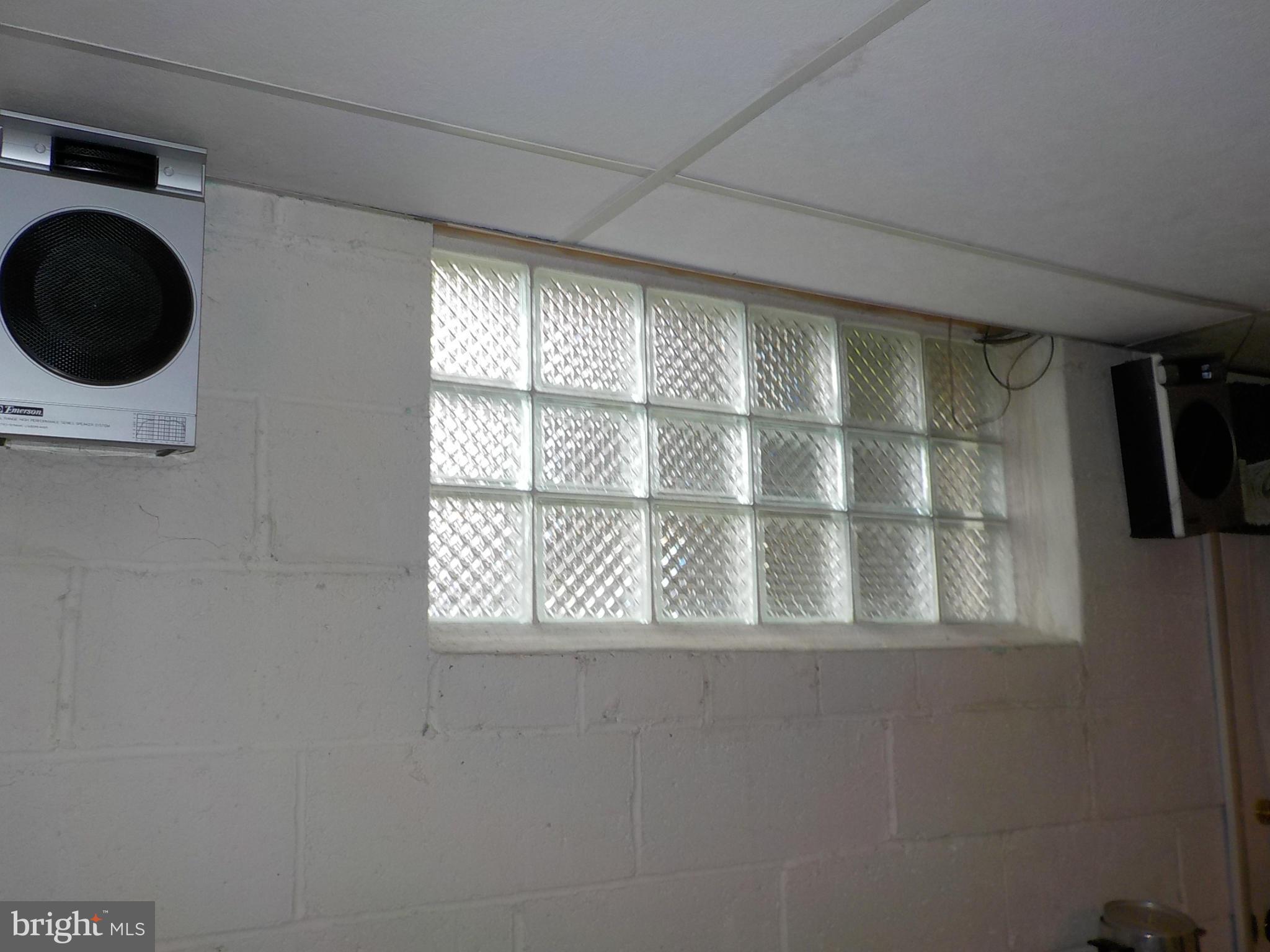 944 Middleborough Road Baltimore, MD 21221 - Photo 24 of 30 a view of an empty room with a window and washer
