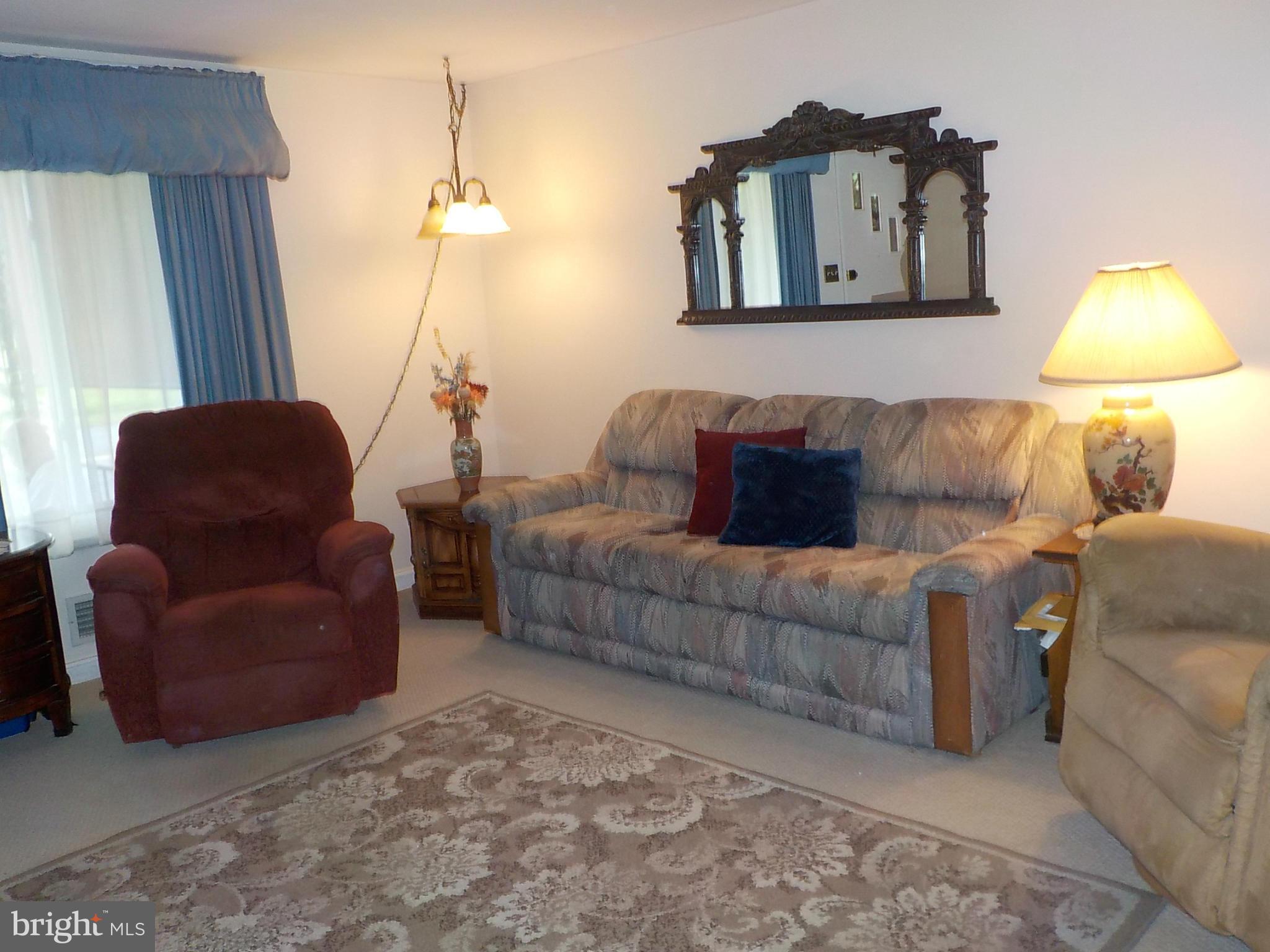944 Middleborough Road Baltimore, MD 21221 - Photo 4 of 30 a living room with furniture and a window