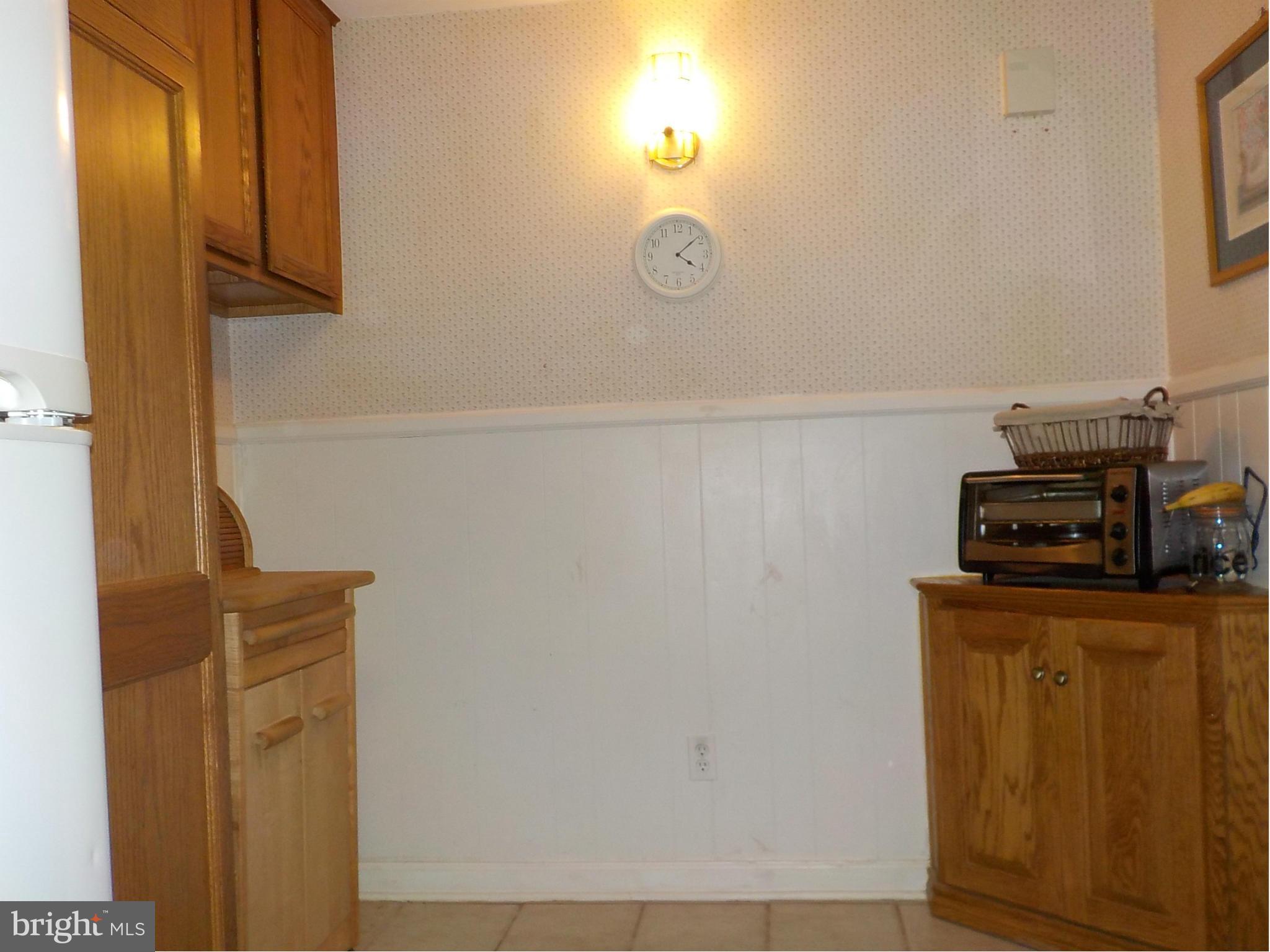 944 Middleborough Road Baltimore, MD 21221 - Photo 10 of 30 a view of a kitchen with wooden floor