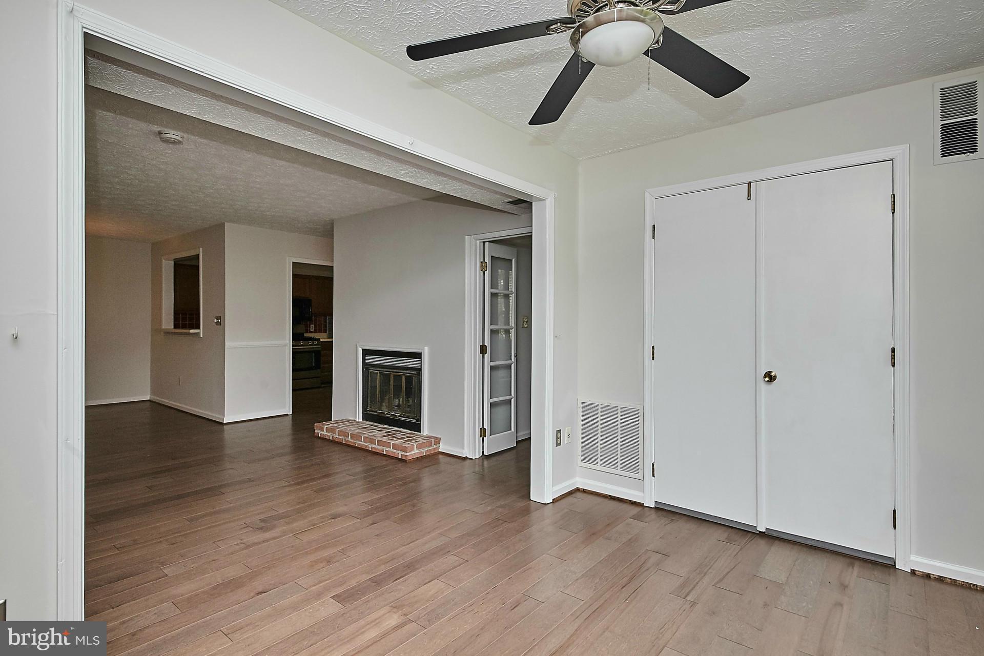 2265 Hunter's Run Drive, Unit 2265 Reston, VA 20191 - Photo 19 of 30 Living to Dining Room