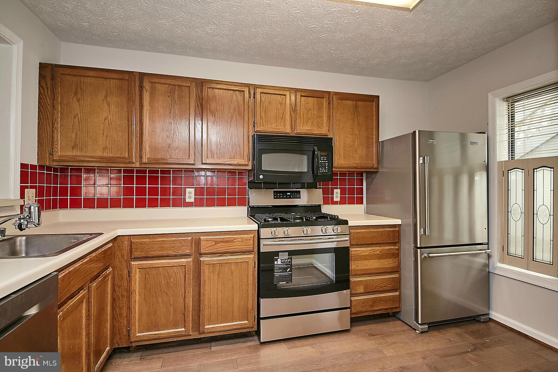 2265 Hunter's Run Drive, Unit 2265 Reston, VA 20191 - Photo 3 of 30 Kitchen