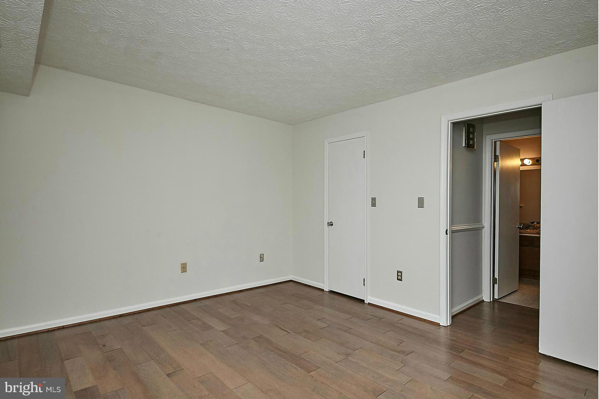 2265 Hunter's Run Drive, Unit 2265 Reston, VA 20191 - Photo 24 of 30 Bedroom