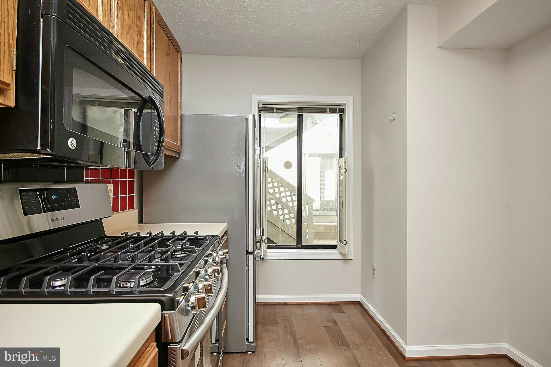 2265 Hunter's Run Drive, Unit 2265 Reston, VA 20191 - Photo 4 of 30 Kitchen