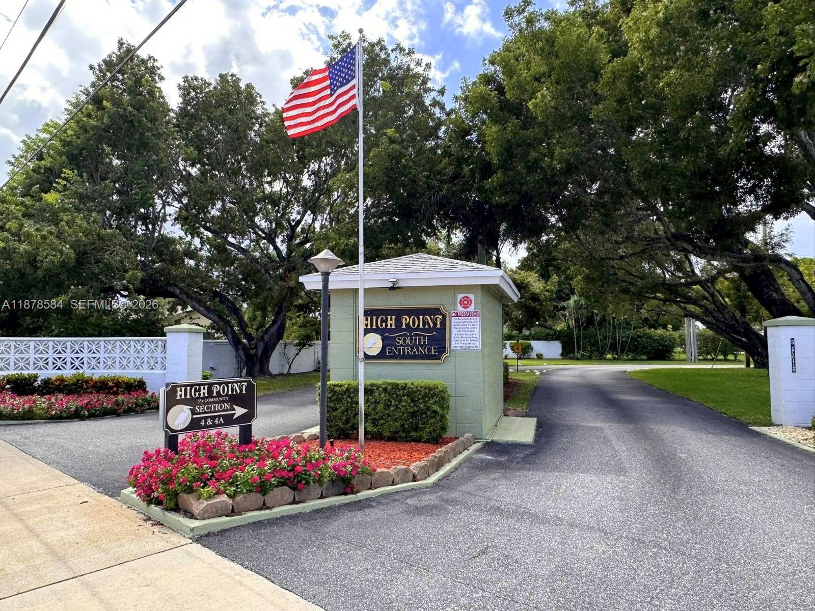 285 North High Point, Unit A Boynton Beach, FL 33435 - Photo 28 of 32 a sign board with parking space