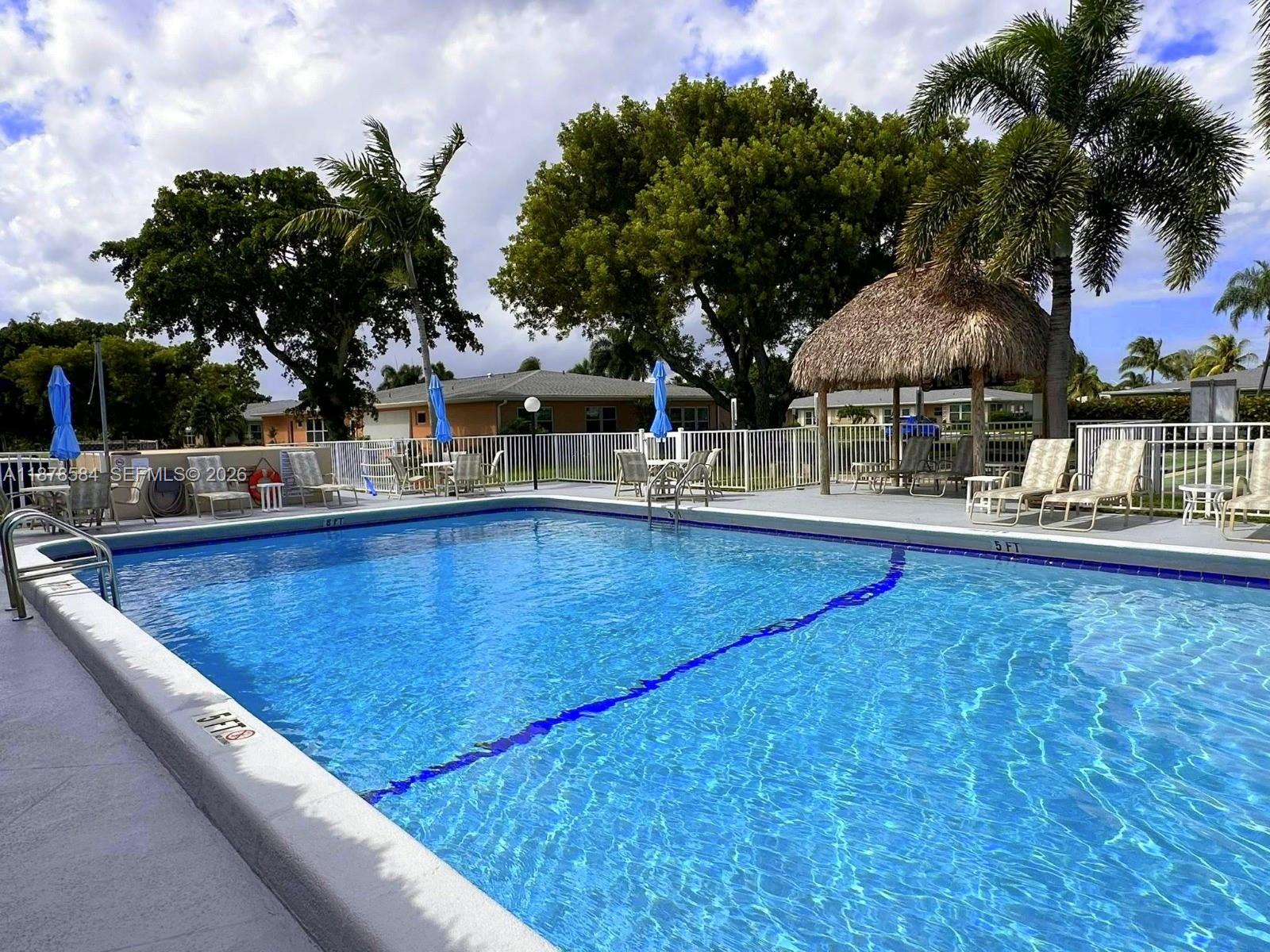 285 North High Point, Unit A Boynton Beach, FL 33435 - Photo 31 of 32 swimming pool view with a outdoor space