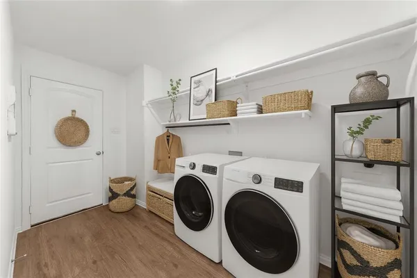 a view of kitchen and utility room with washer and dryer