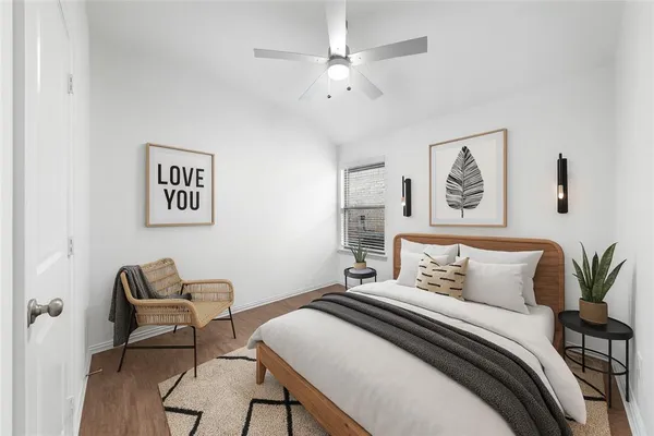 a bedroom with a bed and a furniture