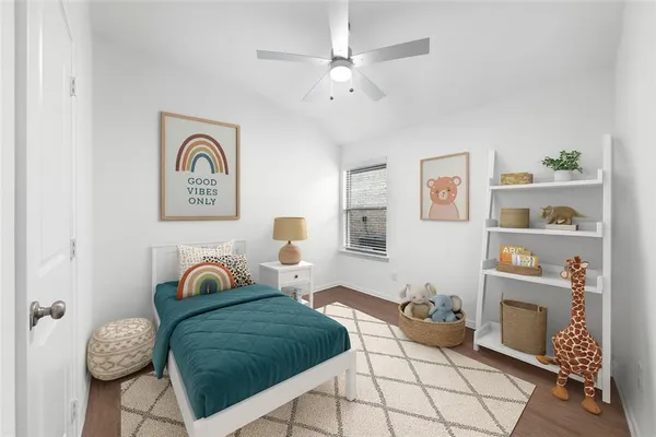 a bedroom with furniture and a fireplace