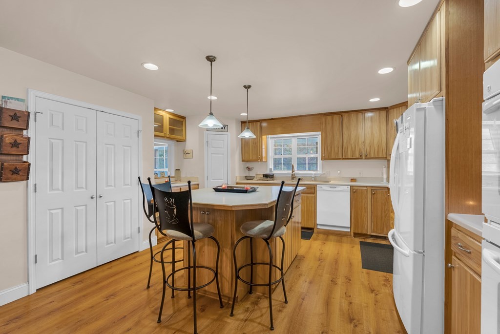 908 River Chase Trail Clarkrange, TN 38553 - Photo 12 of 46 a view of a dining room with furniture and wooden floor