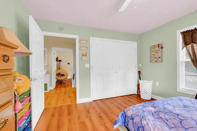 a bedroom with a bed and a cabinets