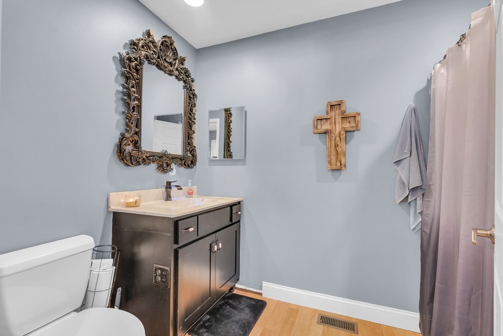 908 River Chase Trail Clarkrange, TN 38553 - Photo 24 of 46 a bathroom with a sink toilet and mirror