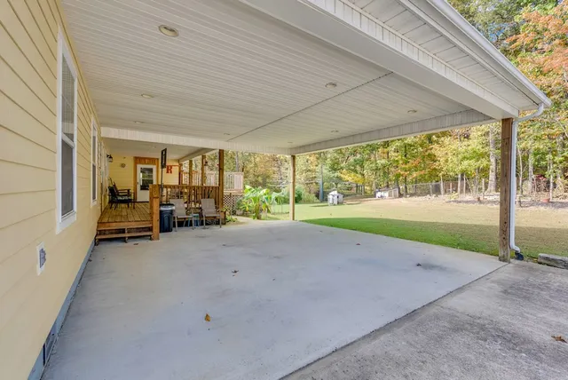 a view of a patio with backyard