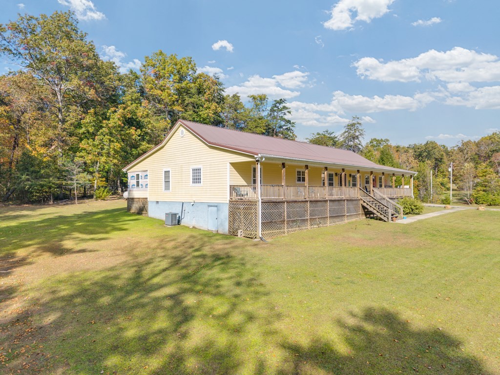 908 River Chase Trail Clarkrange, TN 38553 - Photo 3 of 46 a view of a house with pool and garden