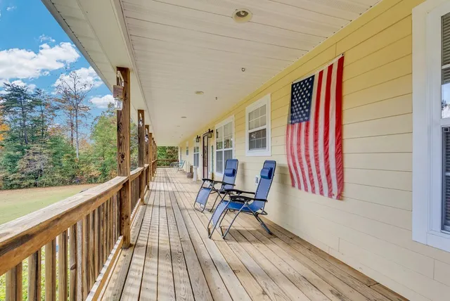 a view of balcony with chairs