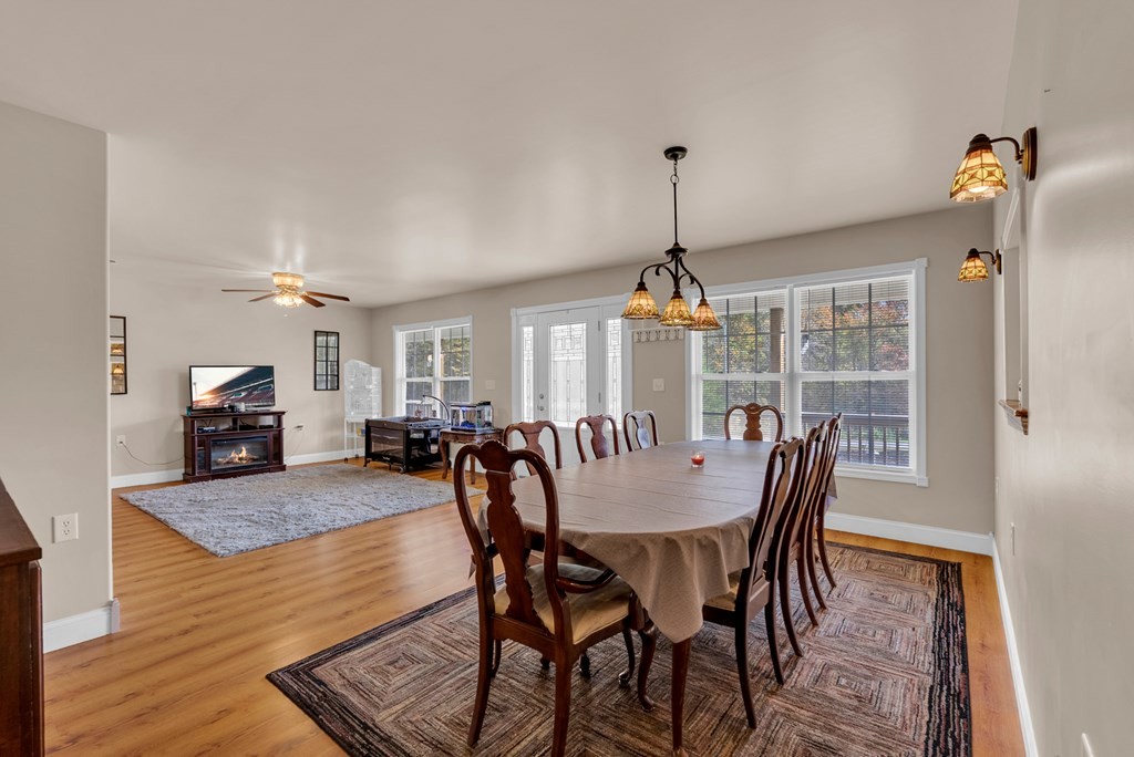 908 River Chase Trail Clarkrange, TN 38553 - Photo 10 of 46 a view of a dining room with furniture window and wooden floor