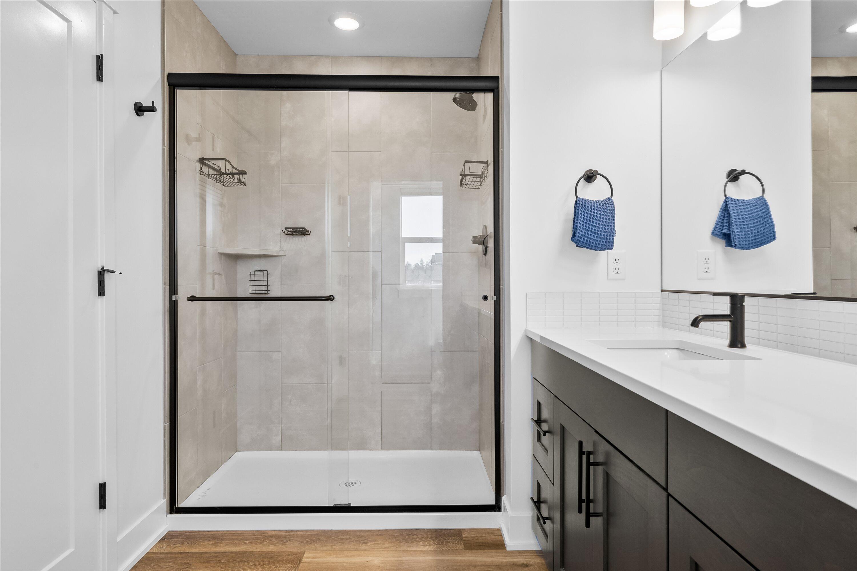 60903 Southeast Epic Place Bend, OR 97702 - Photo 26 of 48 a bathroom with a sink and a mirror