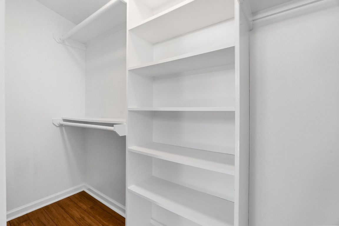 1309 Singleton Avenue, Unit 2 Austin, TX 78702 - Photo 19 of 25 a view of walk in closet with empty racks