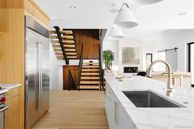 a workspace with furniture window and wooden floor