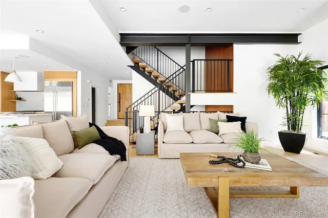 a living room with a couch and a table