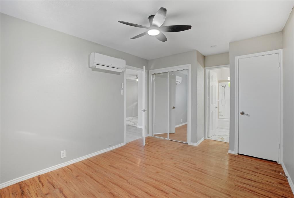 3310 Douglas Avenue, Unit B Dallas, TX 75219 - Photo 8 of 11 a view of empty room with wooden floor