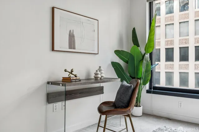 a bathroom with a tub shower and sink