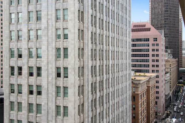 a view of a city with tall buildings