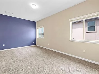 417 Tula Trail Leander, TX 78641 - Photo 13 of 24 a view of an empty room with a window