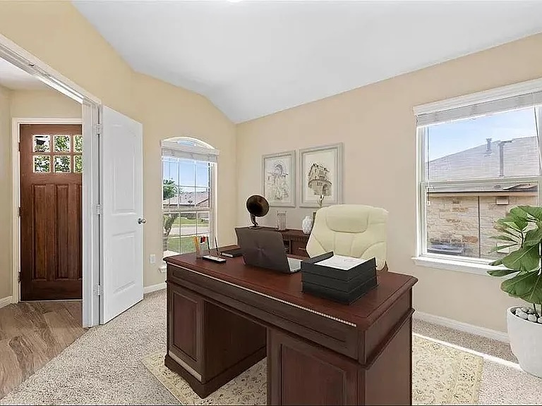 417 Tula Trail Leander, TX 78641 - Photo 3 of 24 a living room with furniture a window and a potted plant