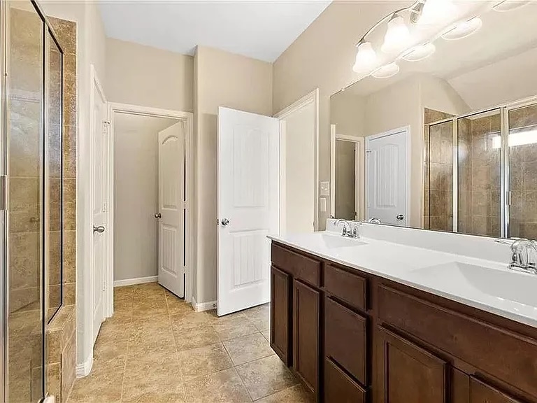 417 Tula Trail Leander, TX 78641 - Photo 9 of 24 a bathroom with a double vanity sink mirror and double