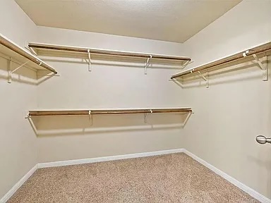417 Tula Trail Leander, TX 78641 - Photo 10 of 24 a view of an empty walk in closet