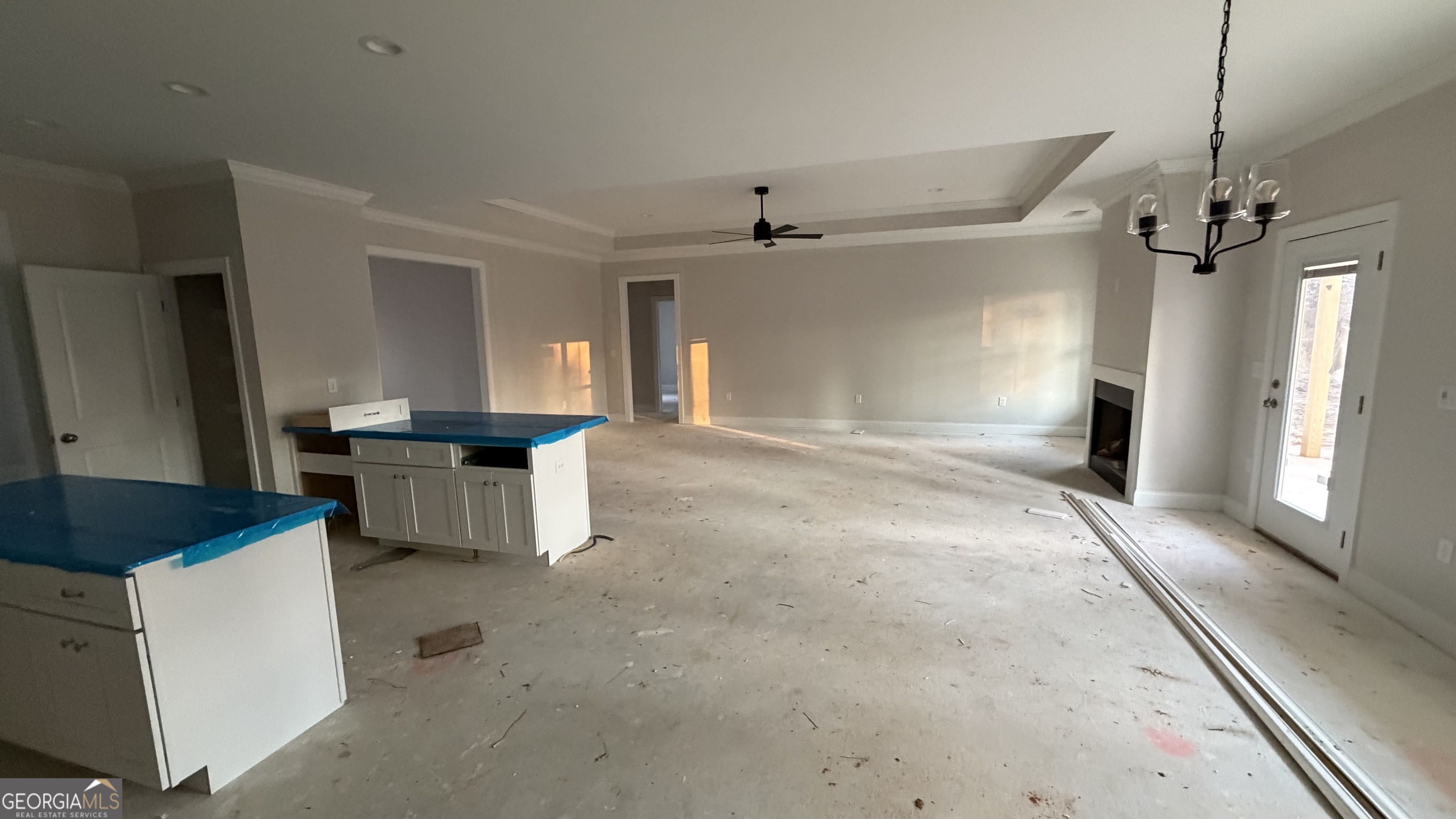 905 Sweet Magnolia Lane Dublin, GA 31021 - Photo 19 of 53 a view of an empty room and kitchen view