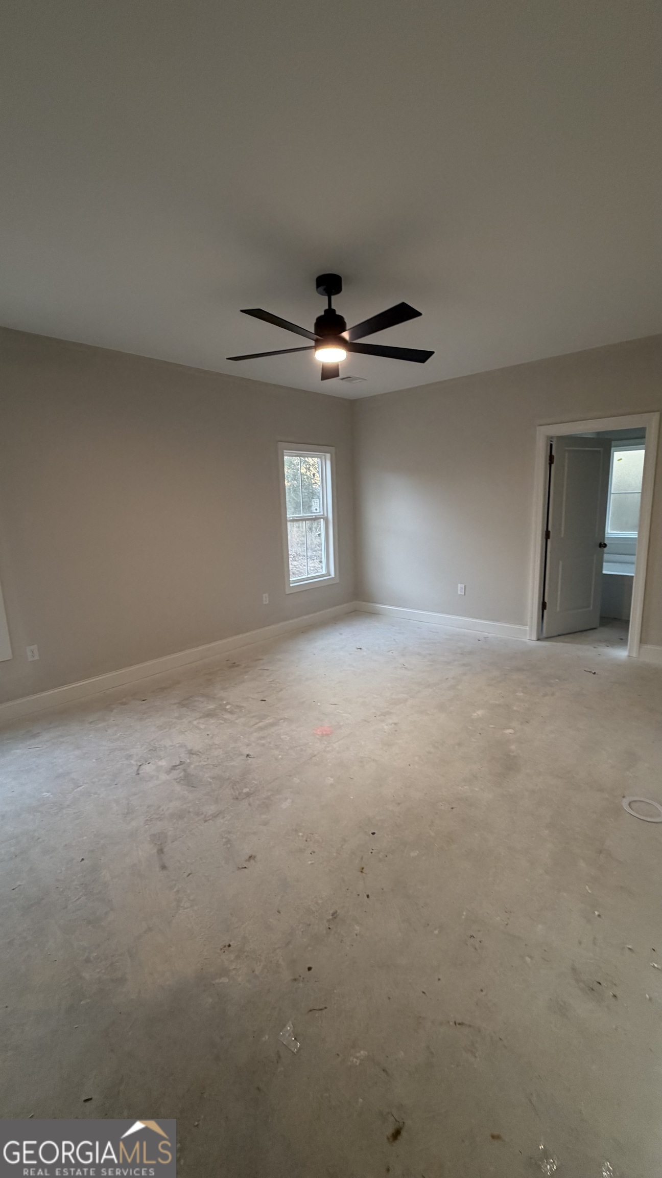 905 Sweet Magnolia Lane Dublin, GA 31021 - Photo 25 of 53 a view of an empty room with a window