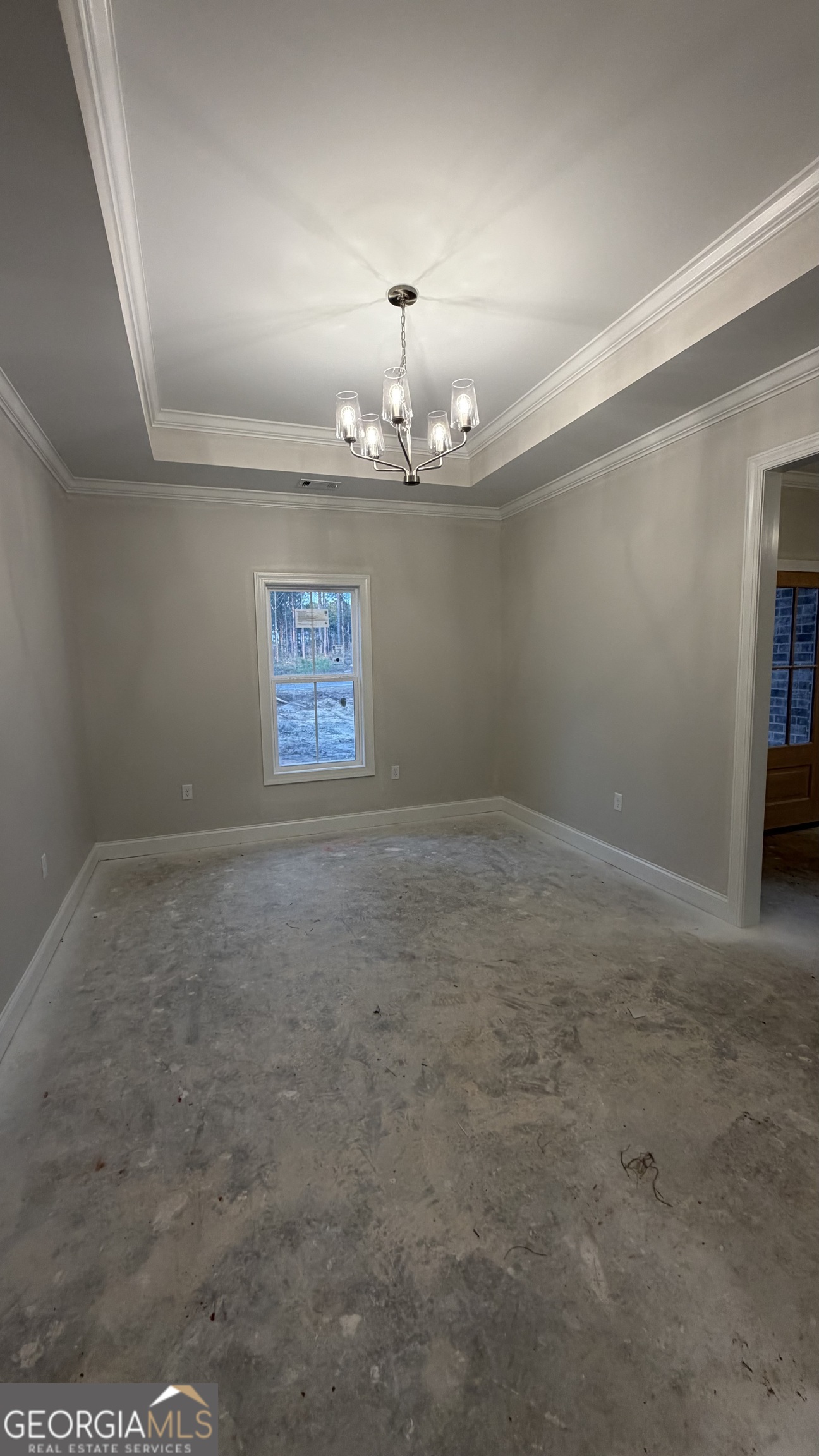 905 Sweet Magnolia Lane Dublin, GA 31021 - Photo 28 of 53 a view of a chandelier fan and fire place