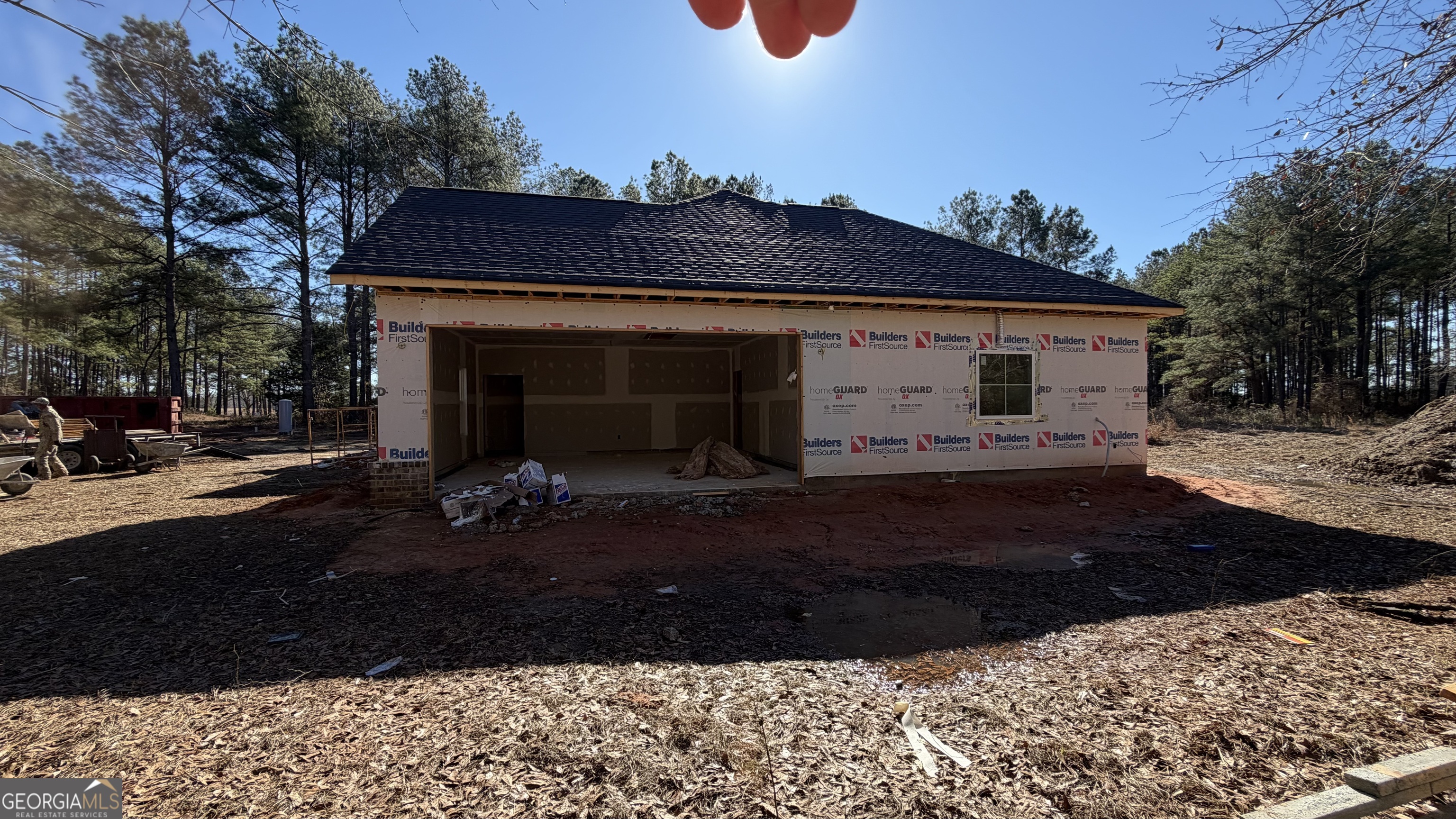 905 Sweet Magnolia Lane Dublin, GA 31021 - Photo 39 of 53 a view of a grey house with a yard