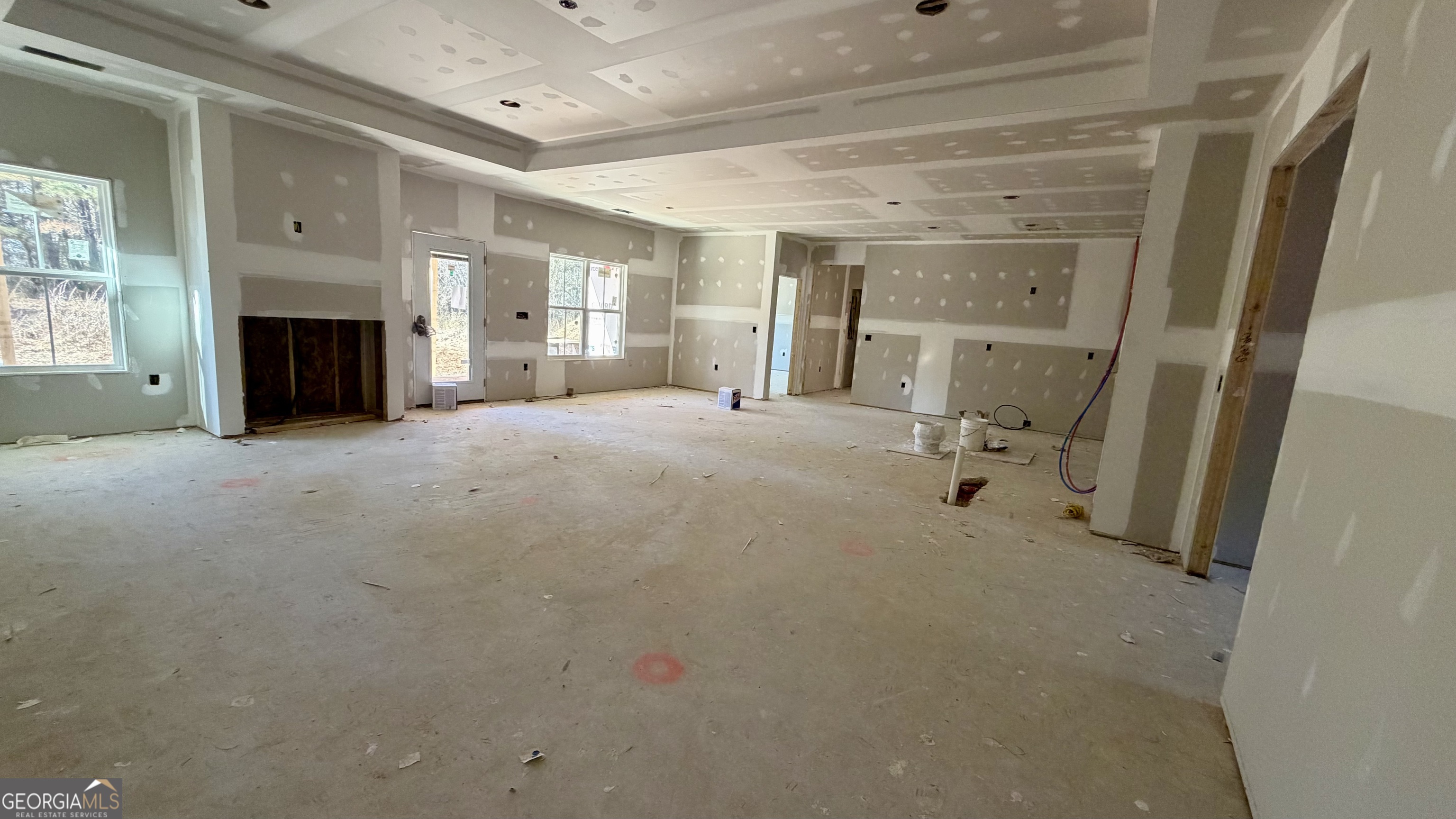 905 Sweet Magnolia Lane Dublin, GA 31021 - Photo 5 of 53 a big room with closet and a fireplace