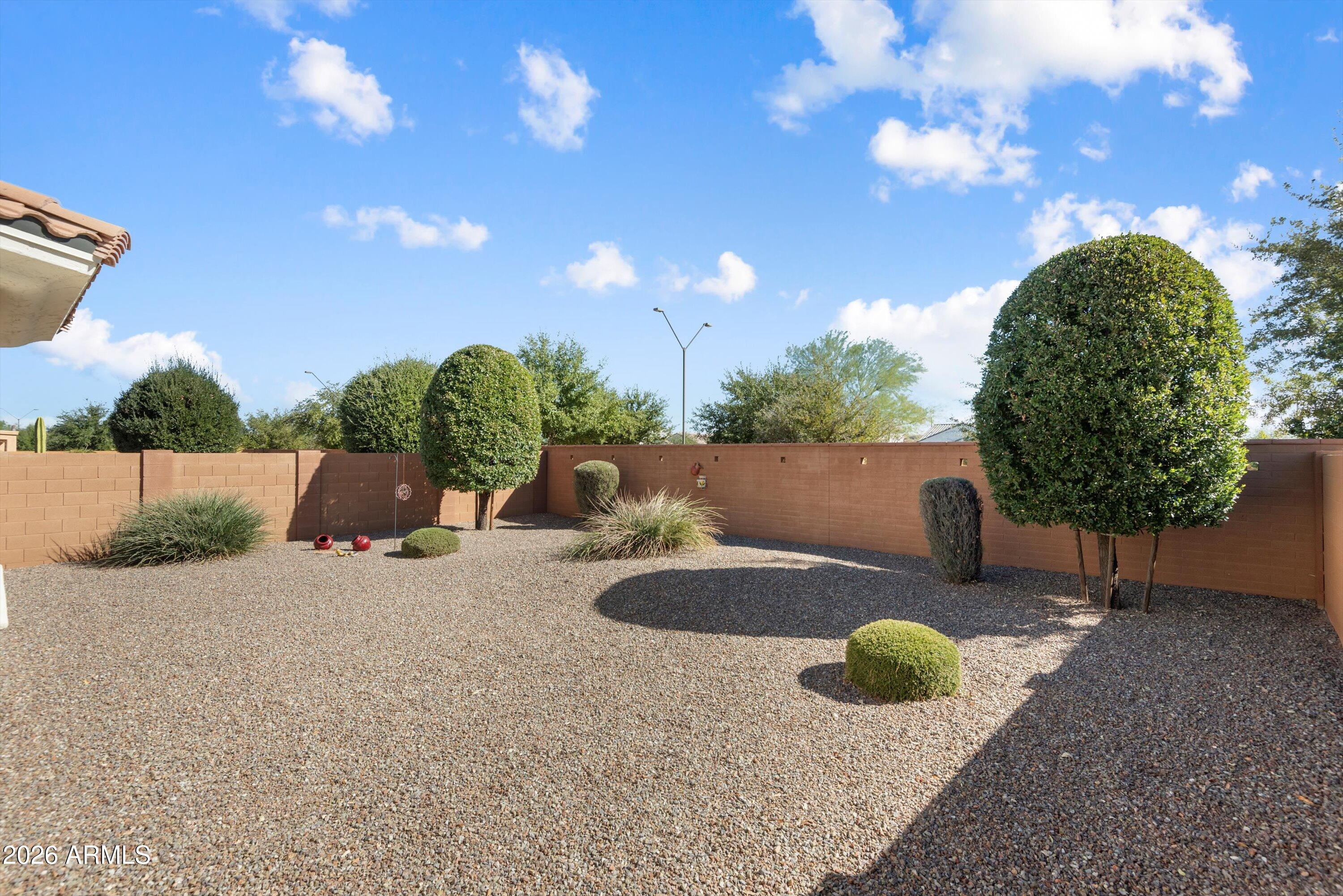 21613 North 261st Avenue Buckeye, AZ 85396 - Photo 27 of 52 a view of backyard with swimming pool