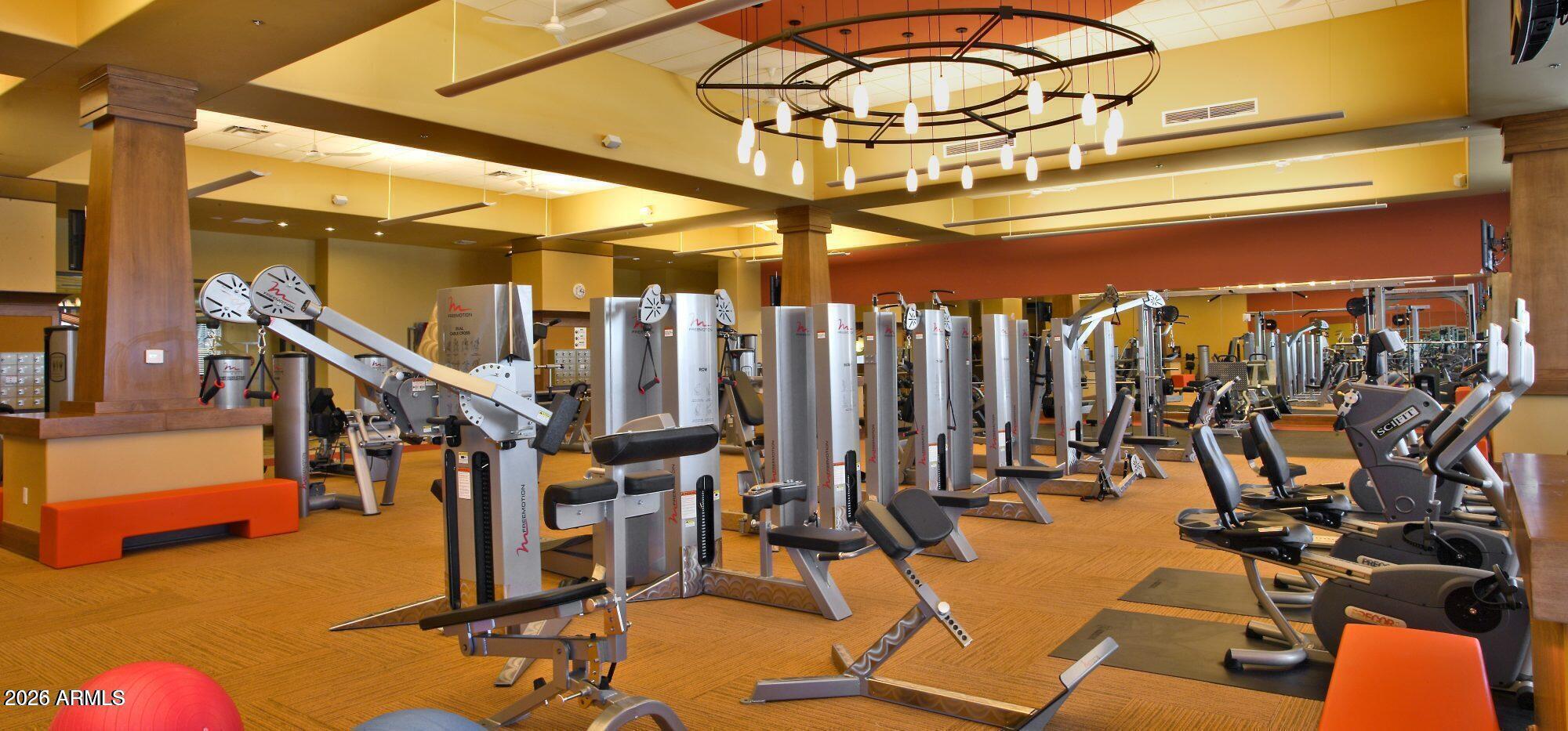 21613 North 261st Avenue Buckeye, AZ 85396 - Photo 35 of 52 a view of a room with gym equipment