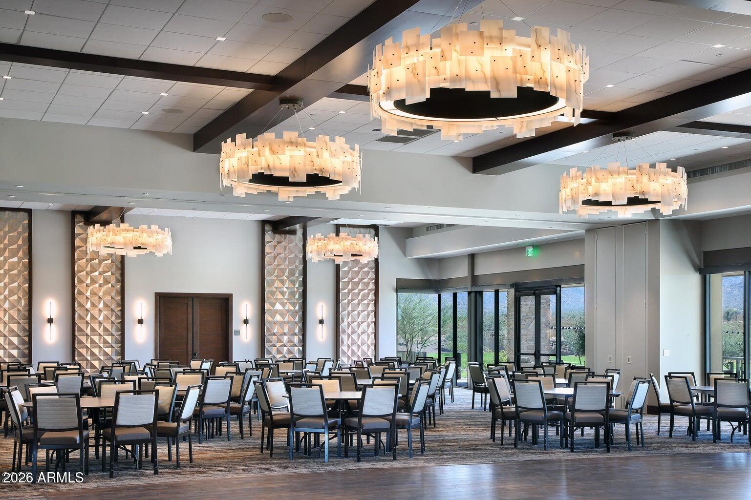 21613 North 261st Avenue Buckeye, AZ 85396 - Photo 36 of 52 a view of a dining room with furniture and chandelier