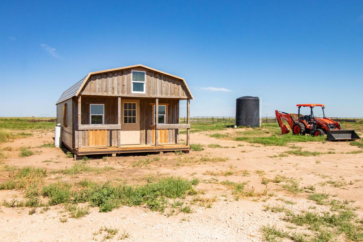 Walcott Ranch Hereford, TX 79045 - Photo 23 of 53 a view of a house with swimming pool
