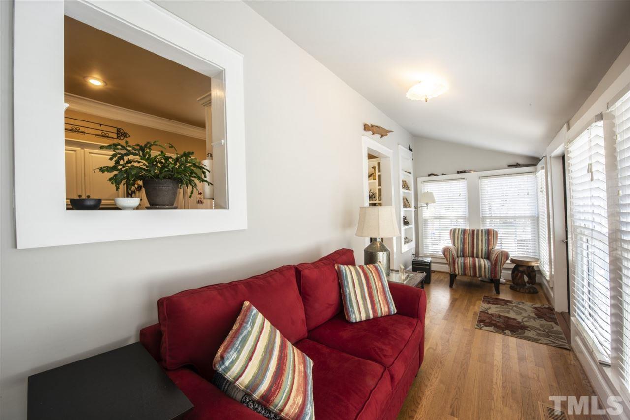 5300 Mitchell Mill Road Wake Forest, NC 27587 - Photo 15 of 27 a living room with furniture or couch and a large window
