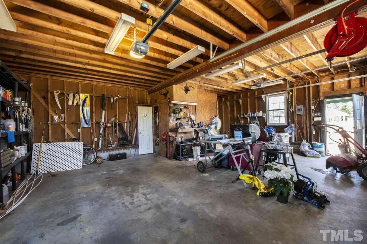 5300 Mitchell Mill Road Wake Forest, NC 27587 - Photo 24 of 27 a view of a room with gym equipment