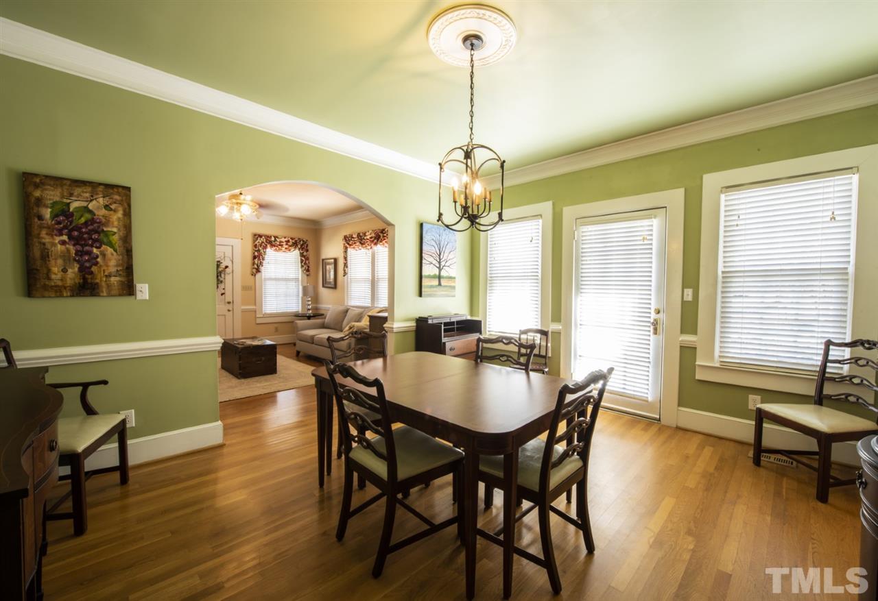 5300 Mitchell Mill Road Wake Forest, NC 27587 - Photo 5 of 27 a view of a dining room with furniture window and wooden floor