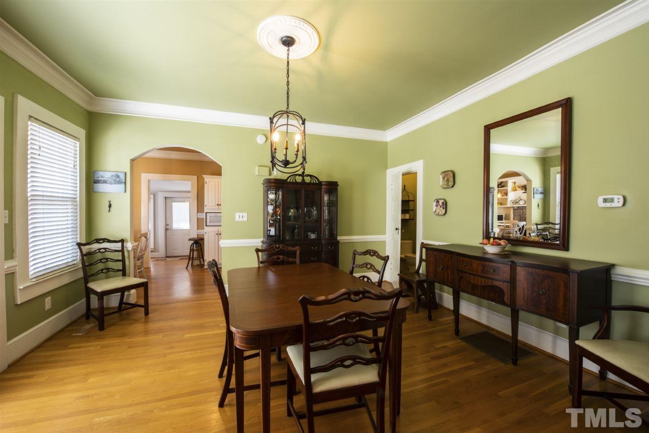 5300 Mitchell Mill Road Wake Forest, NC 27587 - Photo 6 of 27 a view of a dining room with furniture and chandelier