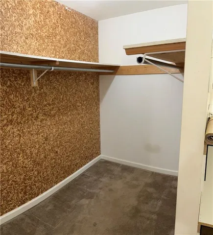a bathroom with a sink double vanity and a window