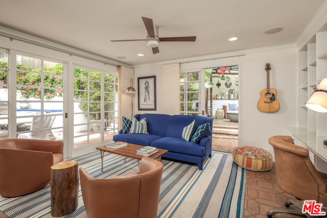 548 Dryad Road Santa Monica, CA 90402 - Photo 11 of 34 a living room with furniture and a large window