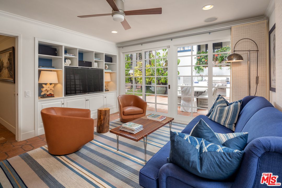 548 Dryad Road Santa Monica, CA 90402 - Photo 12 of 34 a living room with furniture and a flat screen tv